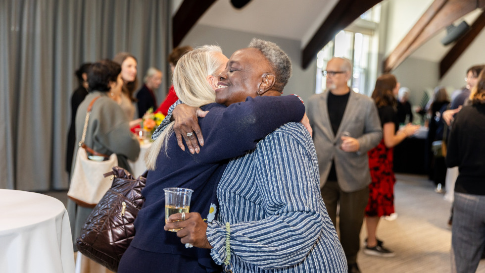 People socializing at the celebration.