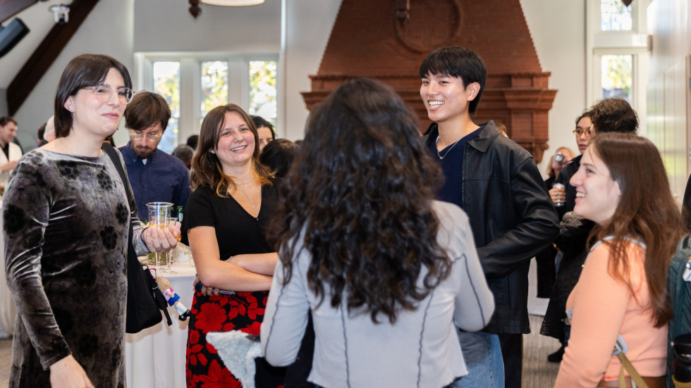 People socializing at the celebration.