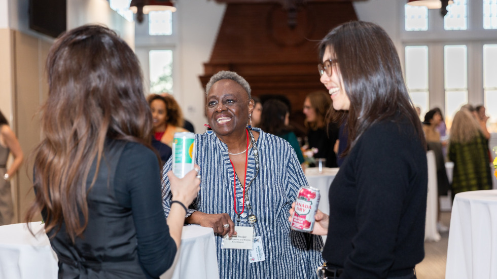 People socializing at the celebration.