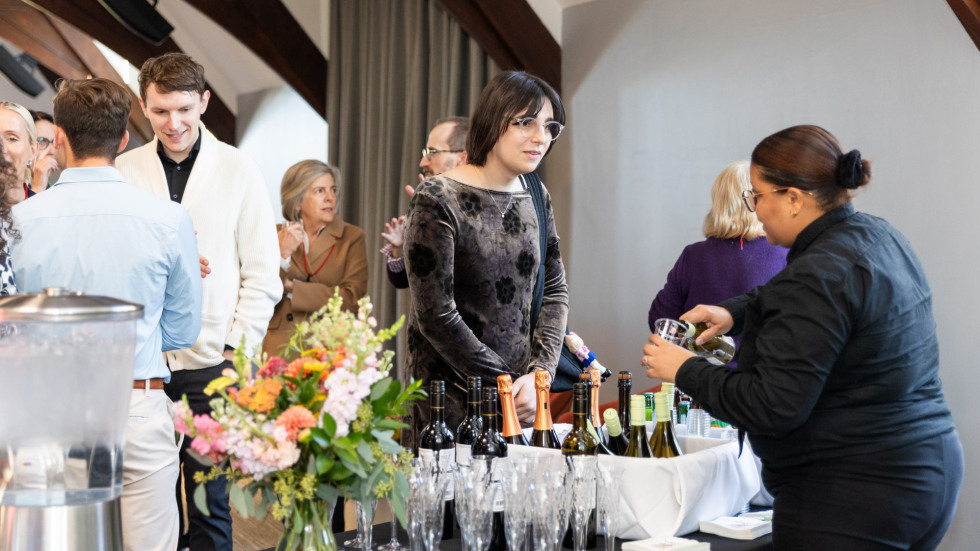 People socializing at the celebration.