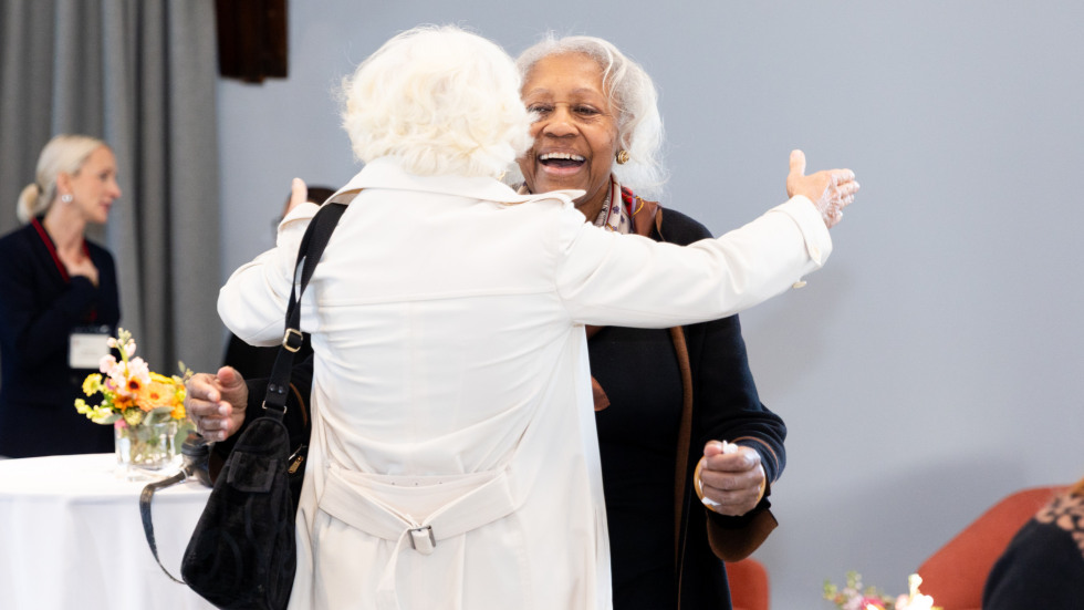People socializing at the celebration.
