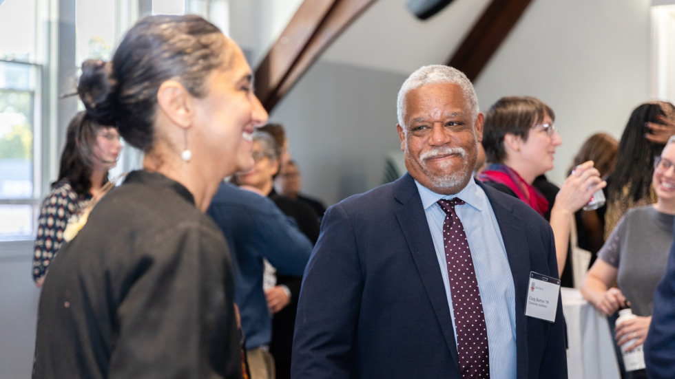 People socializing at the celebration.