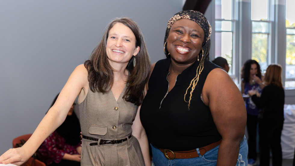 People socializing at the celebration.