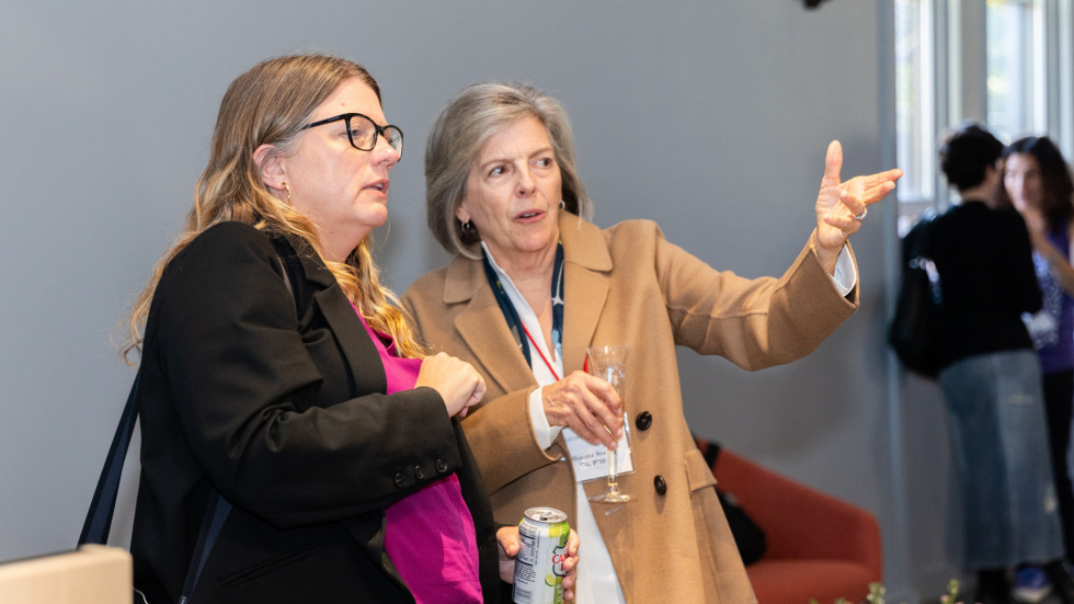 People socializing at the celebration.