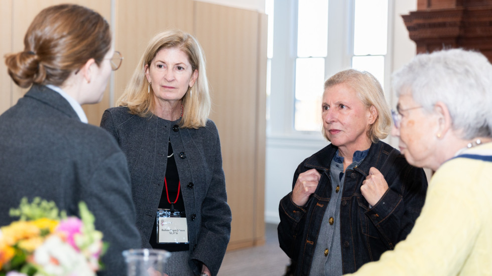 People socializing at the celebration.
