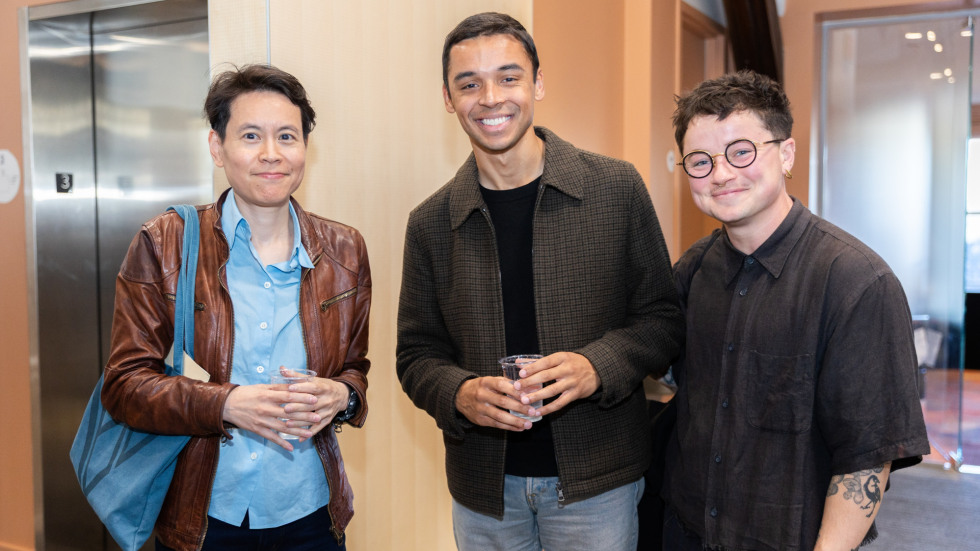 People socializing at the celebration.