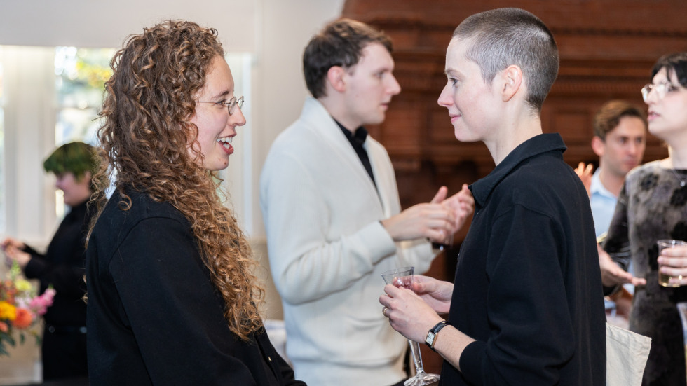 People socializing at the celebration.